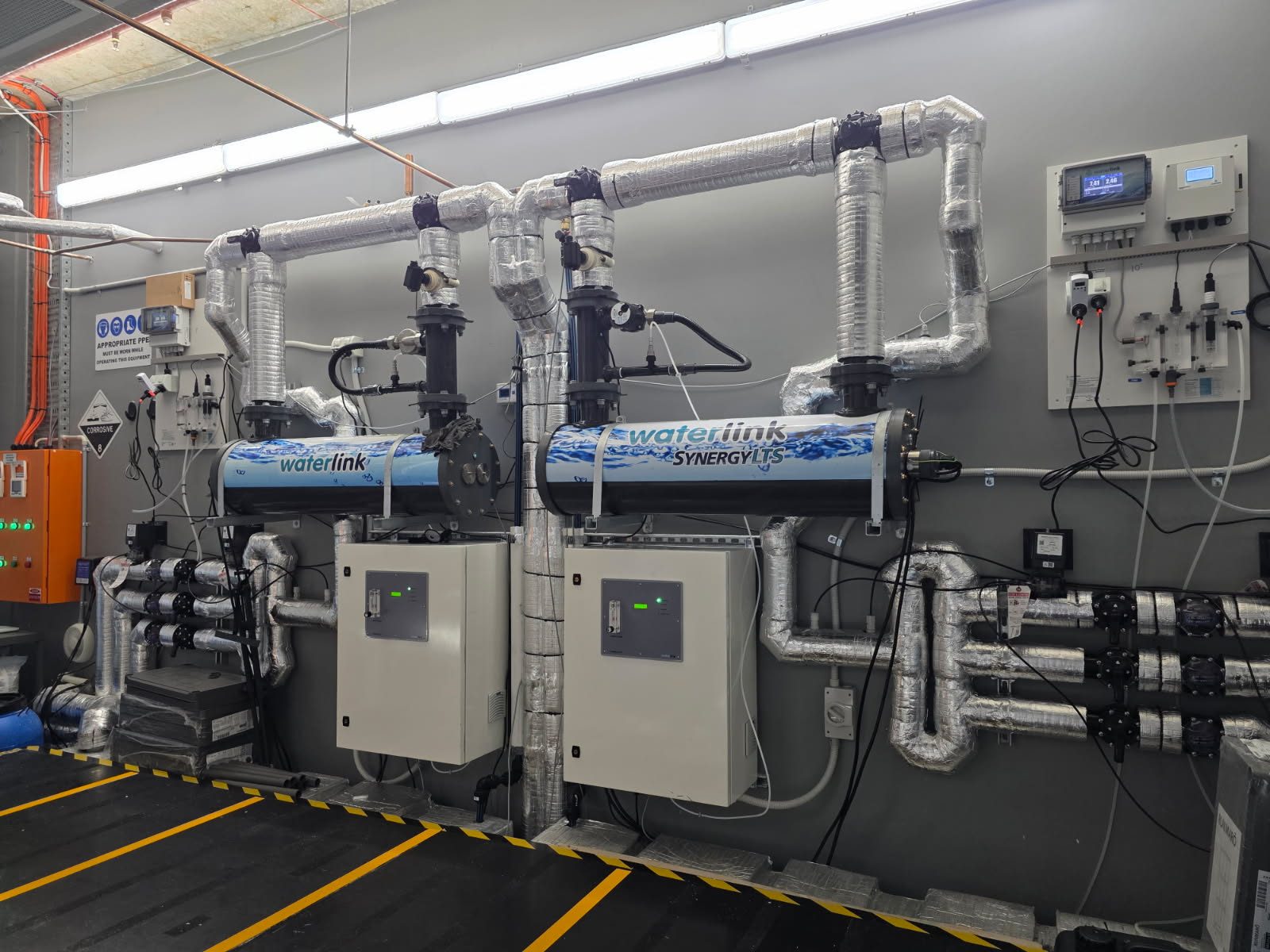 Waterlink Synergy LTS plantroom with insulated pipework and dosing controls